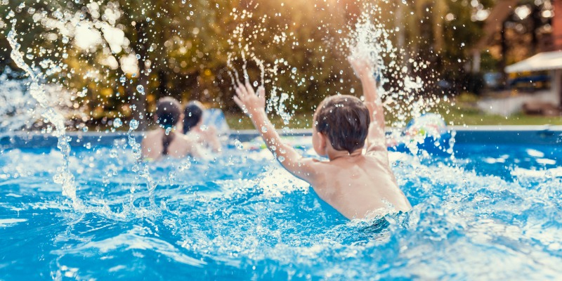 Children having fun in the pool