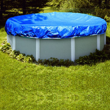 Above ground pool covered by blue fitted Winter cover