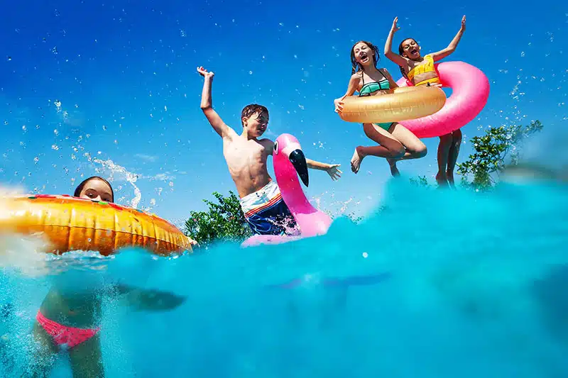 Kids Playing In Pool Mobile